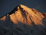 Gokyo 3 1 Cho Oyu At Sunrise Close Up From Gokyo The sun slowly descends the south face of Cho Oyu (8201m), the sixth highest mountain in the world, at sunrise from Gokyo, turning the colour of the face from a golden yellow to extremely bright white within a few minutes.